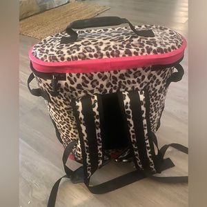 Glitzy girl cooler. Holds 20 cans. Used for one beach trip.